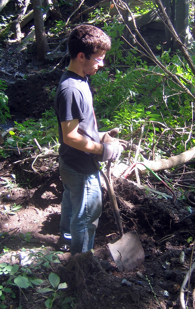 Kyle digging a hole full of blackglass, August 25th, 2010